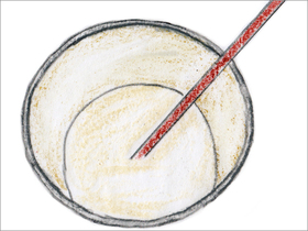 タンクの中で発酵中の醪。酒母に麹と水と蒸米を仕込んだ、日本酒になる前の状態である。