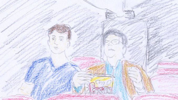 アンドリューとジムの親子はレーズン入りのポップコーン片手に「男の争い」を観る
